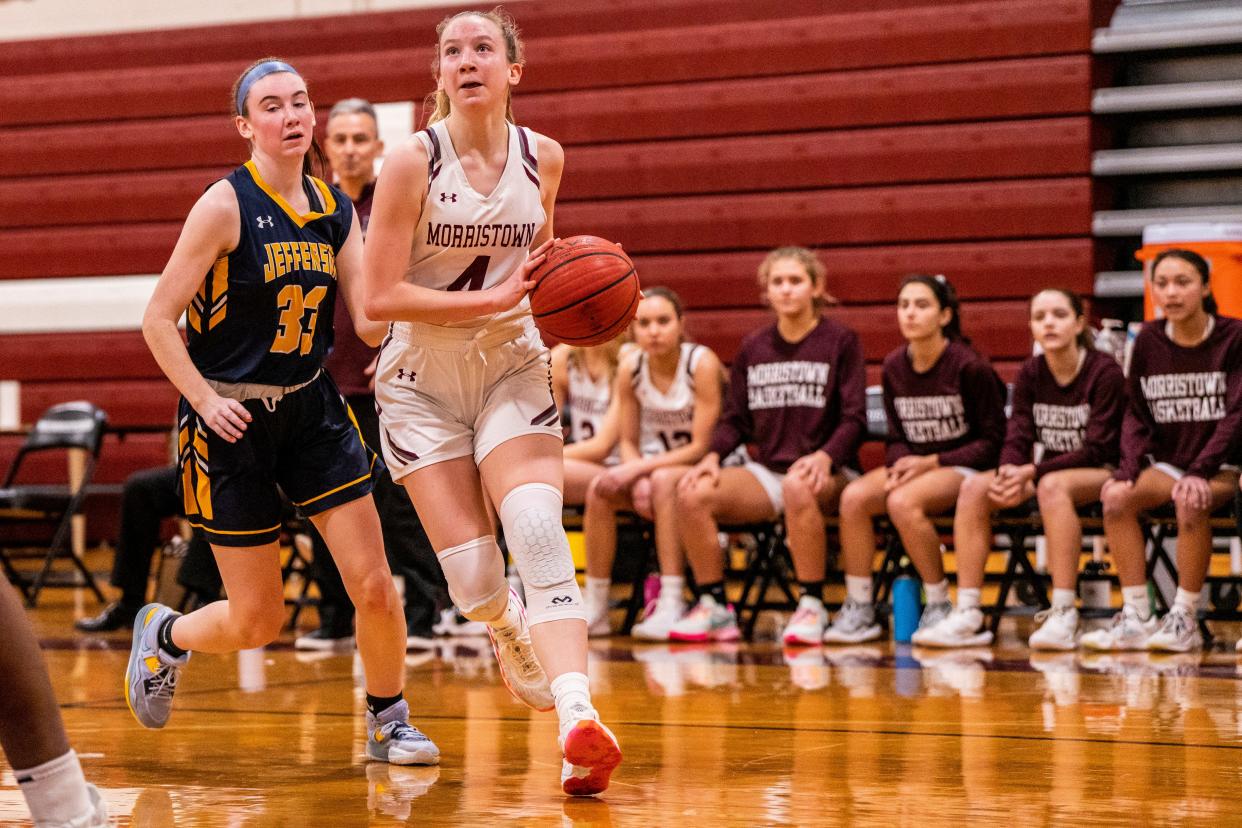 Morristown hosts Jefferson in a girls high school basketball game on Saturday, Dec. 17, 2022. (From left) J #33 Emily Poulas and M #4 Kacie Bush.