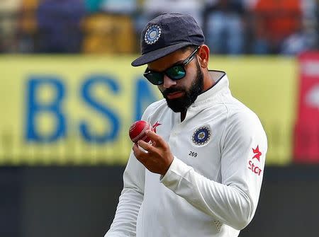 Cricket - India v New Zealand - Third Test cricket match - Holkar Cricket Stadium, Indore, India - 10/10/2016. India's Virat Kohli looks at the ball. REUTERS/Danish Siddiqui