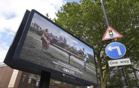 An electronic billboard advertisement encouraging Britons to vote ahead of the British EU referendum, is seen in London, Britain, May 26, 2016. REUTERS/Toby Melville