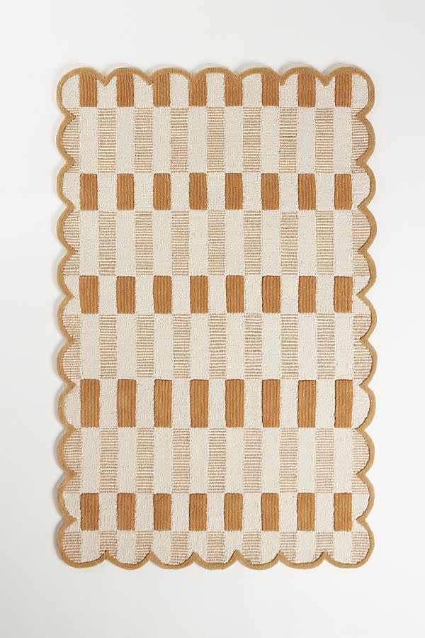 <p><a href="https://go.redirectingat.com?id=74968X1596630&url=https%3A%2F%2Fwww.anthropologie.com%2Fshop%2Fmatilda-goad-co-tufted-plaid-rug&sref=https%3A%2F%2F" rel="nofollow noopener" target="_blank" data-ylk="slk:Shop Now;elm:context_link;itc:0;sec:content-canvas" class="link rapid-noclick-resp">Shop Now</a></p><p>Tufted Plaid Rug</p><p>anthropologie.com</p><p>$1798.00</p>