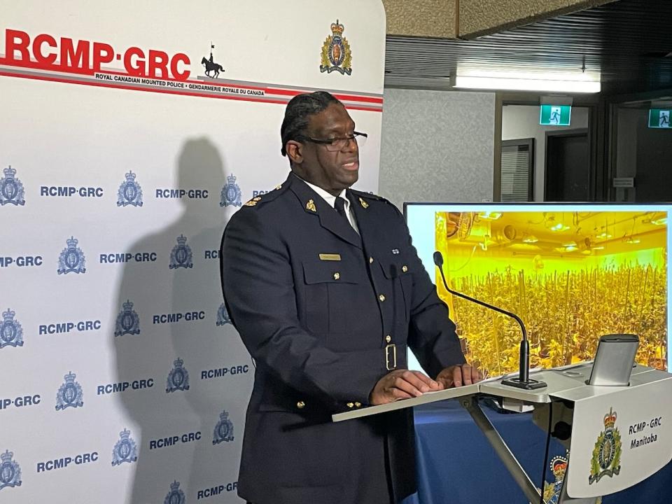 RCMP intelligence officer Insp. Joe Telus shares information with media about Project Decrypt at a news conference at Manitoba RCMP headquarters in Winnipeg on Tuesday, Dec. 5, 2023.
