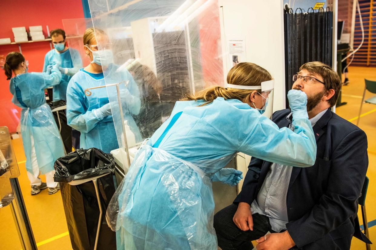 Medical staff carry out COIVD tests in Denmark. (Getty)