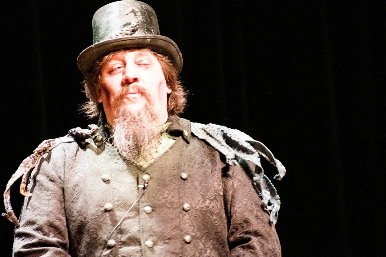 David Detlefs, owner and producer of Vagrant Fear Productions, performs as his alter ego, Narly, during a variety show June 11 at Ames City Auditorium.