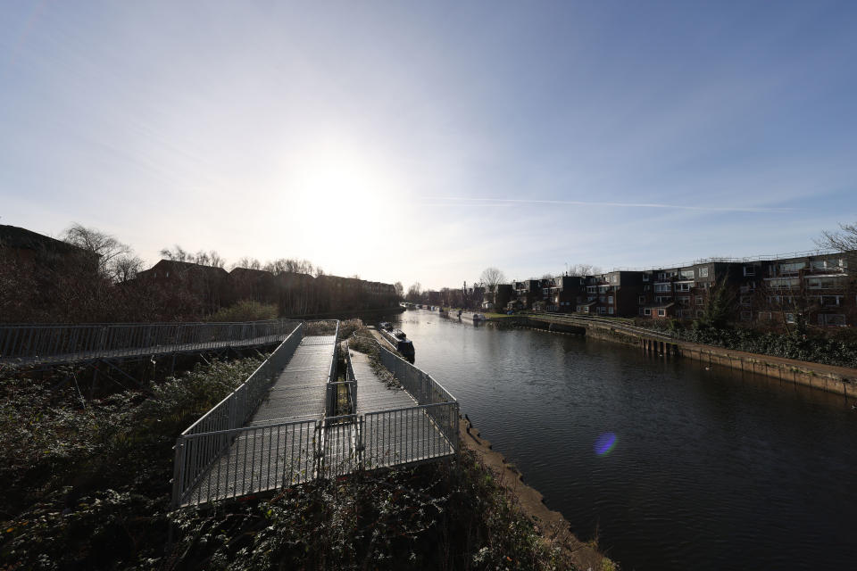 View over a river with the bright sun behind