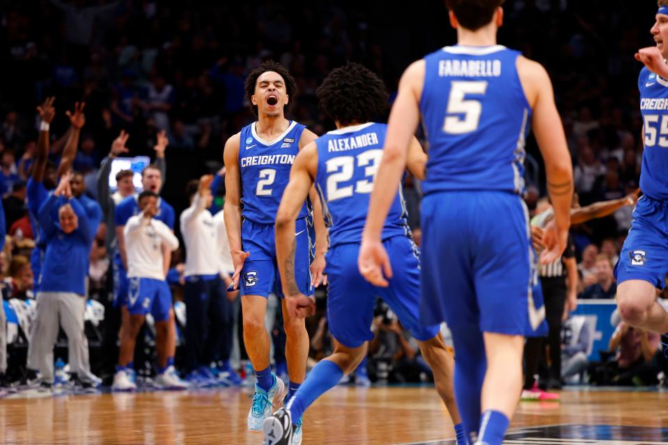 Mar 19, 2023; Denver, CO, USA; Creighton Bluejays guard Ryan Nembhard (2) celebrates after a three point shot with guard Trey Alexander (23) and guard Francisco Farabello (5) and guard Baylor Scheierman (55) in the second half against the Baylor Bears at Ball Arena. Mandatory Credit: Michael Ciaglo-USA TODAY Sports