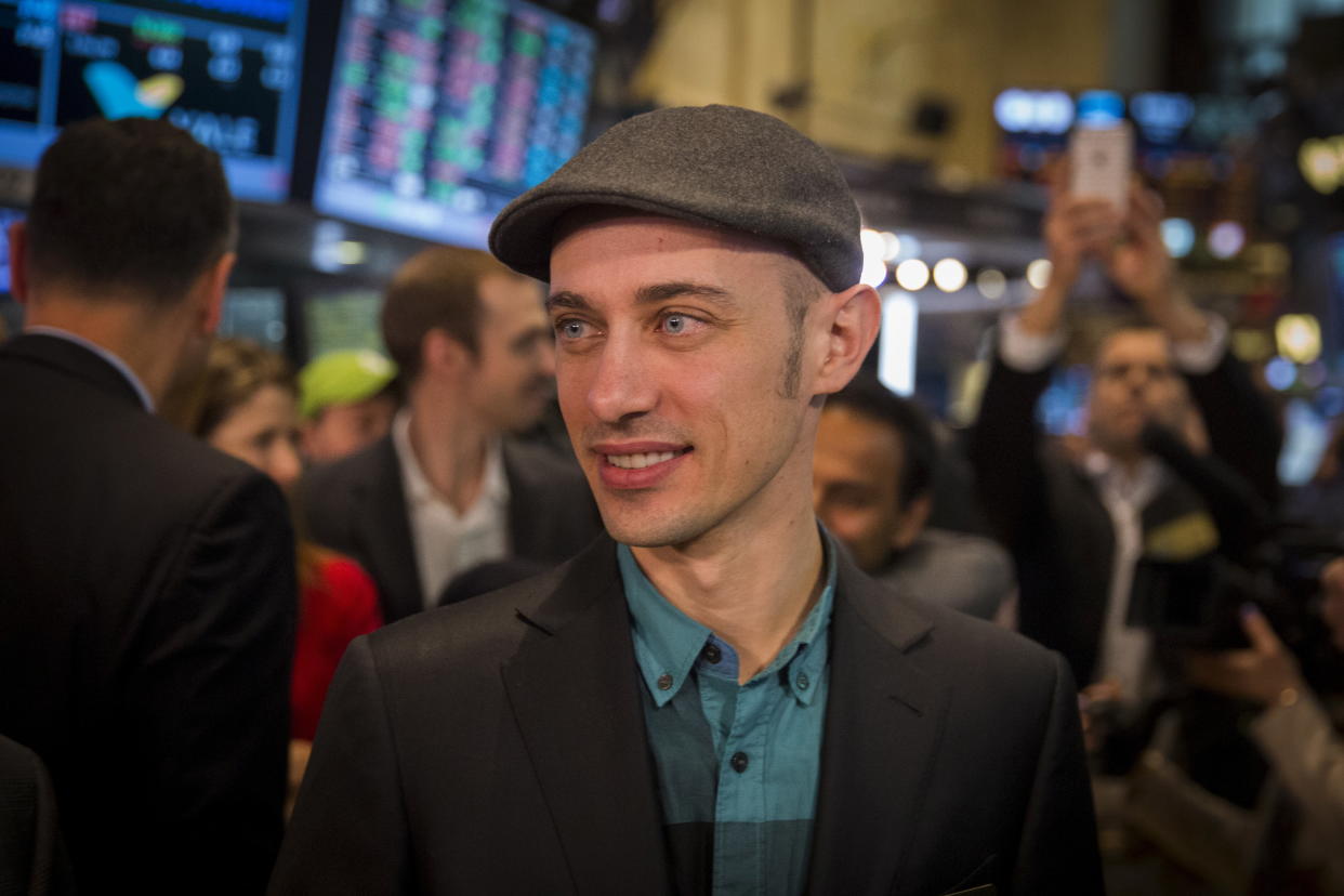 Shopify founder and Chief Executive Officer Tobi Lutke smiles after the company's IPO on the floor of the New York Stock Exchange May 21, 2015.  REUTERS/Lucas Jackson 