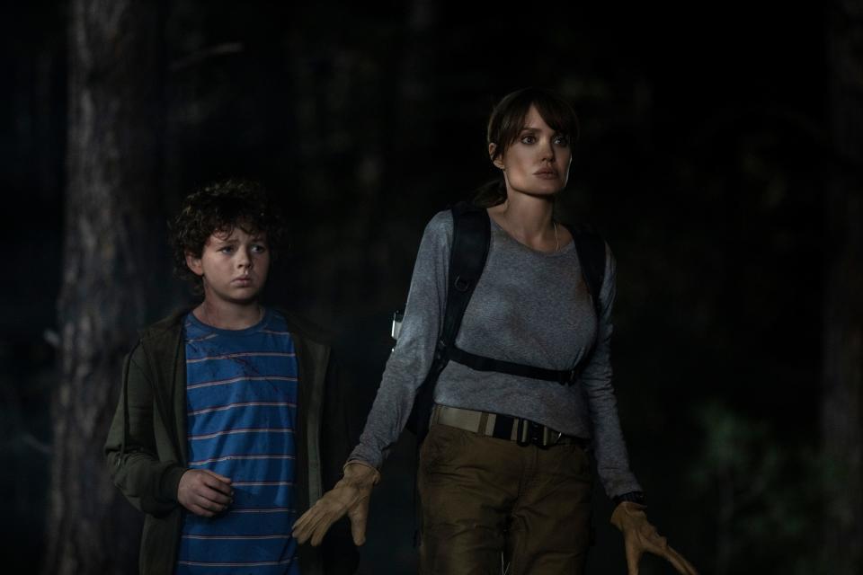 Connor (Finn Little, left) and Hannah (Angelina Jolie) fight to survive in "Those Who Wish Me Dead."