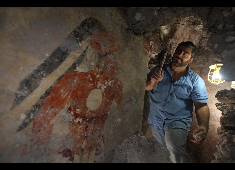 "Younger Brother Obsidian," as labeled on the north wall of the Maya city's house by an unknown hand, was painted in the 9th century A.D. Archaeologist William Saturno of Boston University excavates the house in the ruins of the Maya city of Xultún. Younger Brother Obsidian may have been the town scribe. Excavation and preservation of the site were supported by the National Geographic Society.    Photo by Tyrone Turner © 2012 National Geographic