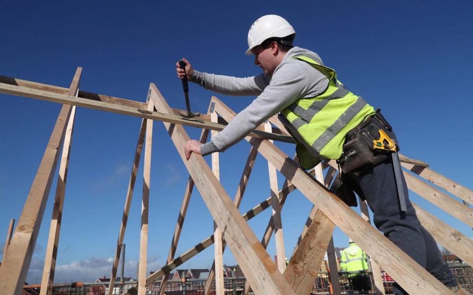 Taylor Wimpey builder - Reuters