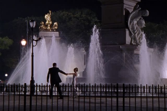 <p>HBO</p> Carrie Bradshaw and Aidan Shaw at the Columbus Circle fountain in 'Sex and the City'.