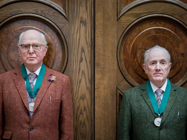 Gilbert and George after receiving their medals at the Royal Academy of Arts in 2017 (Getty)