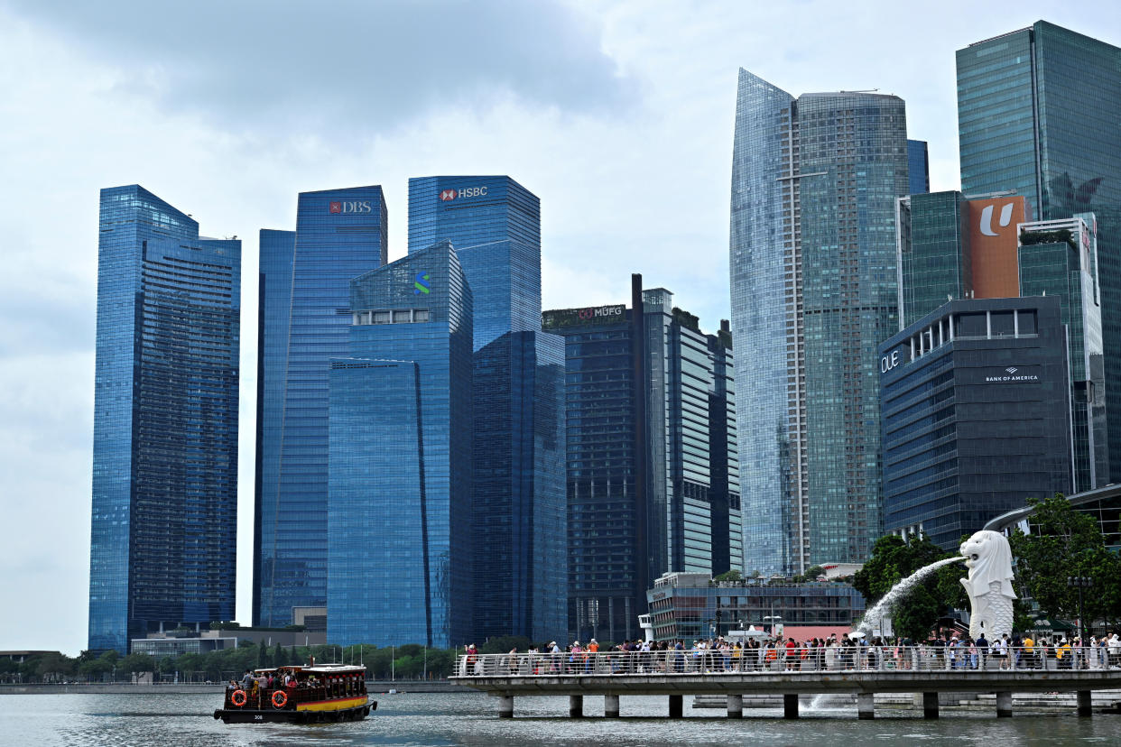 A view of the Merlion against the Singapore financial district in Singapore, January 27, 2023. REUTERS/Caroline Chia