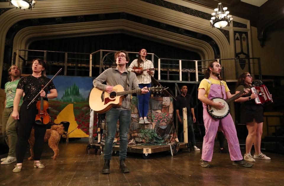 Cast members sing "Ding Dong the Witch is Dead!" during Ohio Shakespeare Festival rehearsal of "The Wizard of Oz" on Wednesday, April 17, 2024 in Akron.