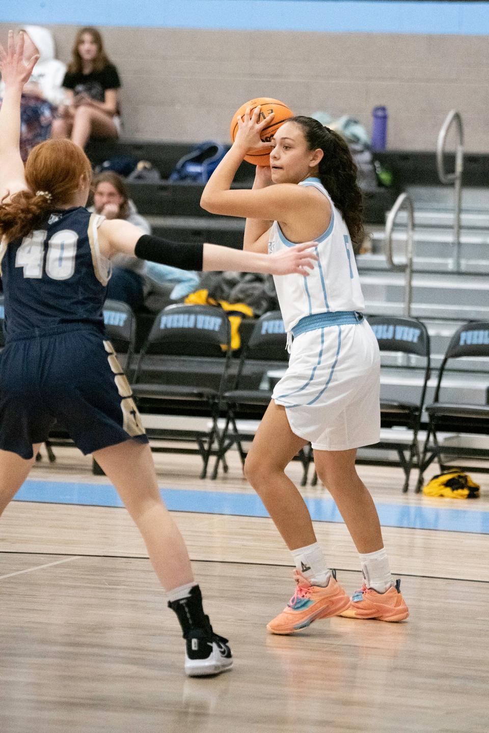 Pueblo West's Jamie Suazo looks to pass during a game against Colorado Springs Christian on Wednesday, Dec. 21, 2022.