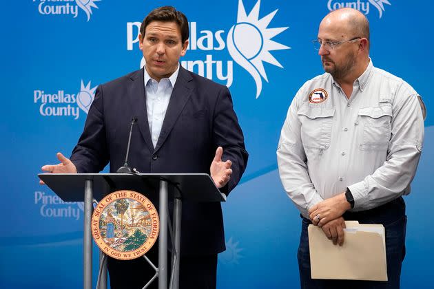 Florida Gov. Ron DeSantis, left, speaks as he stands with Kevin Guthrie, director of the Florida Division of Emergency Management, during a news conference on Sept. 26 in Largo, Florida. (Photo: via Associated Press)