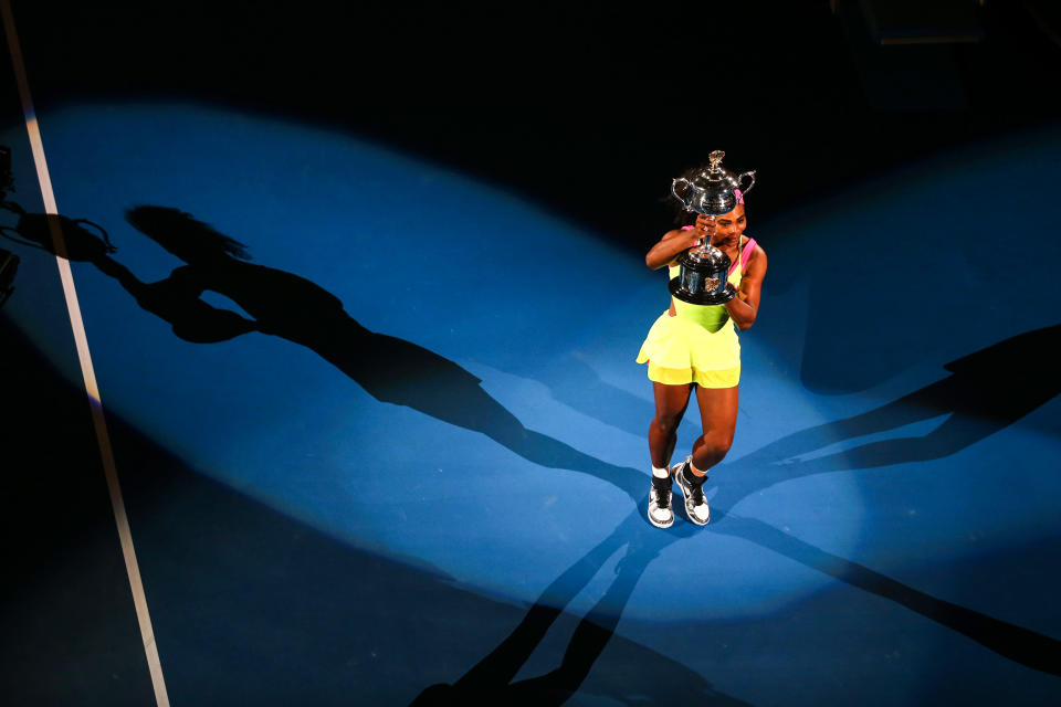 Serena Williams holds the Daphne Akhurst Memorial Cup after winning the women's final match against Maria Sharapova at the Australian Open on Jan. 31, 2015, in Melbourne. (Quinn Rooney / Getty Images file)