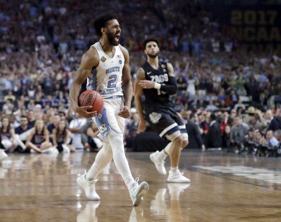 <p>North Carolina’s Joel Berry II (2) celebrates after the finals of the Final Four NCAA college basketball tournament against Gonzaga, Monday, April 3, 2017, in Glendale, Ariz. North Carolina won 71-65. (AP Photo/David J. Phillip) </p>