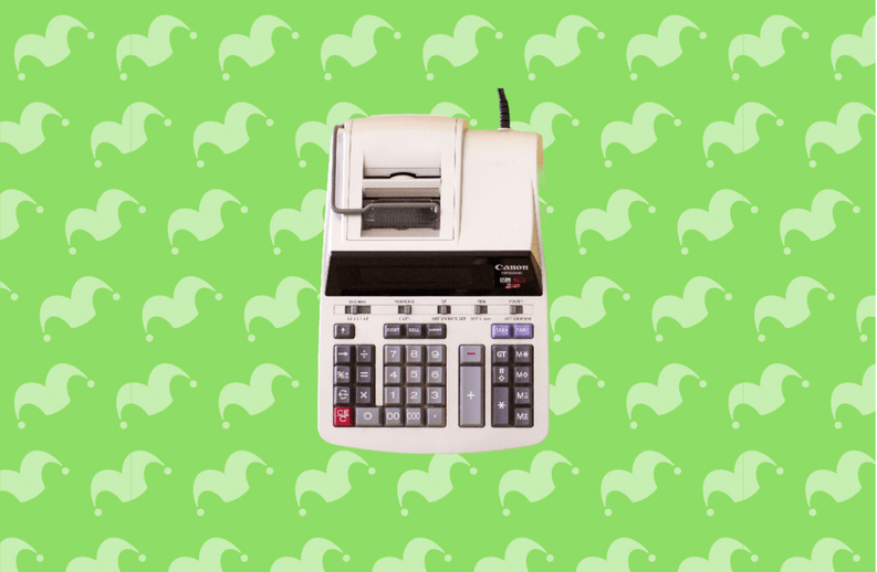 A calculator against a green background
