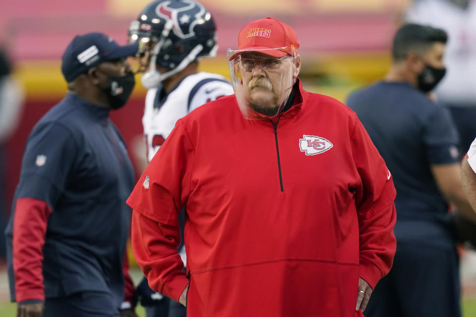 FILE - In this Sept. 10, 2020 file photo, Kansas City Chiefs head coach Andy Reid watches as players warm up before an NFL football game against the Houston Texans in Kansas City, Mo. Buffalo Bills coach Sean McDermott pays credit to experiences and advice he gained working under Reid, while the two were in Philadelphia, including getting fired by Reid in 2010, which McDermott says was the best thing to happen to his career. (AP Photo/Charlie Riedel, File)