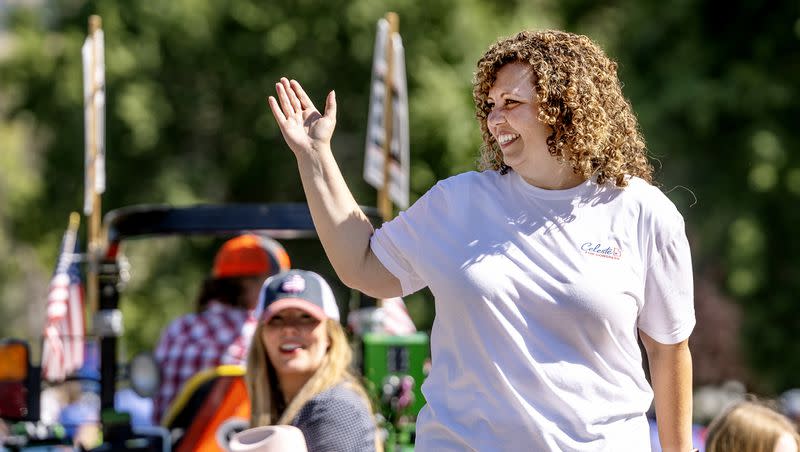 Utah 2nd Congressional District candidate Celeste Maloy waves as she rides in a parade in Farmington on Saturday, July 15, 2023.