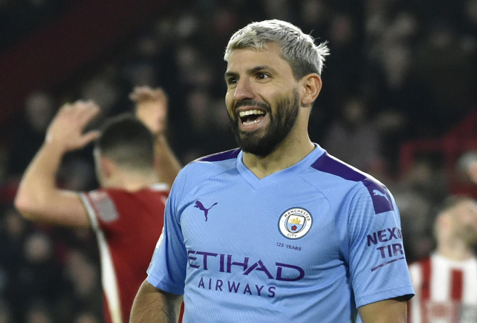 FILE - In this Tuesday, Jan. 21, 2020 file photo, Manchester City's Sergio Aguero smiles during the English Premier League soccer match between Sheffield United and Manchester City at Bramall Lane in Sheffield, England. Sergio Aguero has been using some of his spare time in lockdown to teach British kids how to speak Spanish. The Argentina international has been signed up by the BBC as part of its home-schooling initiative while educational establishments are closed during the coronavirus pandemic. (AP Photo/Rui Vieira, File)