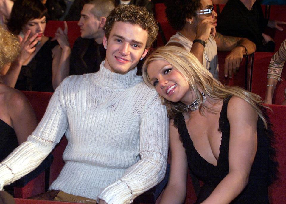 Britney Spears and Justin Timberlake sitting together at the 2000 MTV Video Music Awards 