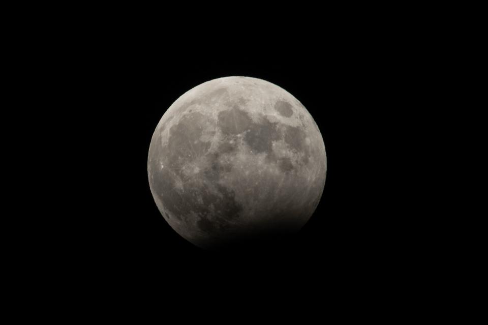 A partial moon eclipse is seen from L'Aquila, Italy, on October 28th, 2023. 6% of the lunar surface will be temporarily deprived of direct sunlight at the middle of the eclipse.