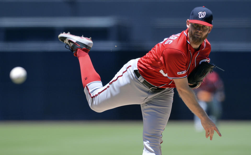 Washington Nationals starting pitcher Stephen Strasburg works against a San Diego Padres batter during the first inning of a baseball game, Sunday, June 9, 2019, in San Diego. (AP Photo/Orlando Ramirez)