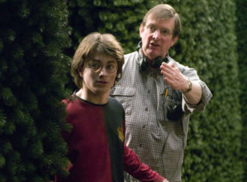 <p>Daniel Radcliffe and director Mike Newell on the set of Warner Bros. Pictures' Harry Potter and the Goblet of Fire - 2005</p>