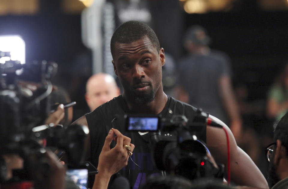 Sacramento Kings' player Harrison Barnes speaks to the media after a training session ahead of their match against Indiana Pacers for the NBA India Games 2019 in Mumbai, India, Thursday, Oct. 3, 2019. (AP Photo/Rajanish Kakade)