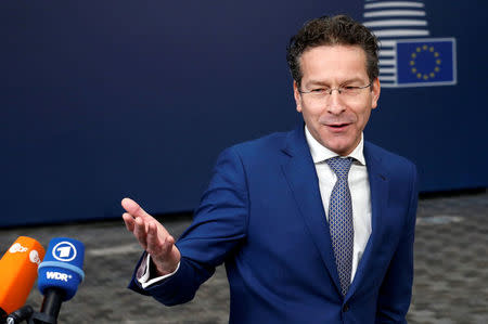 FILE PHOTO: Dutch Finance Minister and Eurogroup President Jeroen Dijsselbloem talks to the media as he arrives at European Union finance ministers meeting in Brussels, Belgium February 21, 2017. REUTERS/Francois Lenoir/File Photo