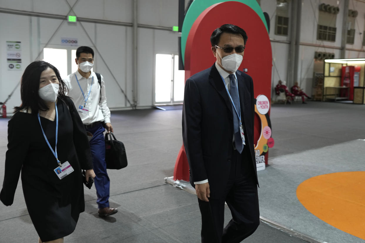 Zhao Yingmin, vice ministry of ecology and environment of China, walks through the COP27 U.N. Climate Summit, Saturday, Nov. 19, 2022, in Sharm el-Sheikh, Egypt. (AP Photo/Peter Dejong)