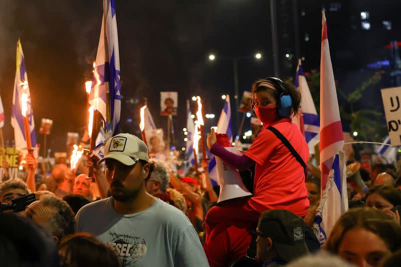 People protest against Israeli Prime Minister Netanyahu's government and call for the release of hostages, in Tel Aviv