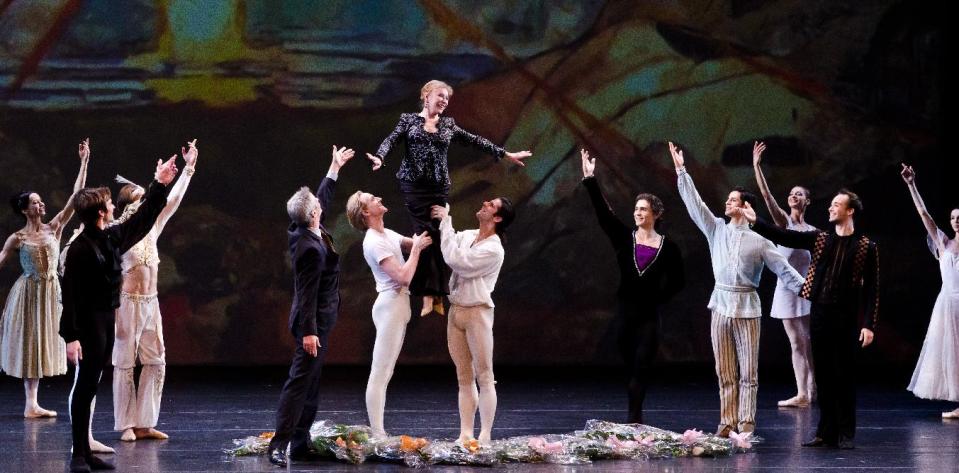 In this April 28, 2012 image released by Jonathan Marder + Company, legendary Russian ballerina Natalia Makarova, center, is hoisted at a tribute to her career at Lincoln Center’s David H. Koch Theater in New York. Dancers from around the world performed at the tribute, which was put on by the Youth America Grand Prix ballet competition. (AP Photo/Jonathan Marder + Company, Liza Voll)