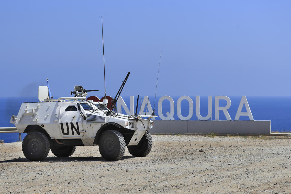 A United Nations Interim Force In Lebanon (UNIFIL) peacekeeping force vehicle patrols in the southern coastal border Lebanese-Israeli town of Naqoura, Lebanon, Monday, June 6, 2022. The Lebanese government invited on Monday a U.S. envoy mediating between Lebanon and Israel over their disputed maritime border to return to Beirut as soon as possible to work out an agreement amid rising tensions along the border. (AP Photo/Mohammed Zaatari)