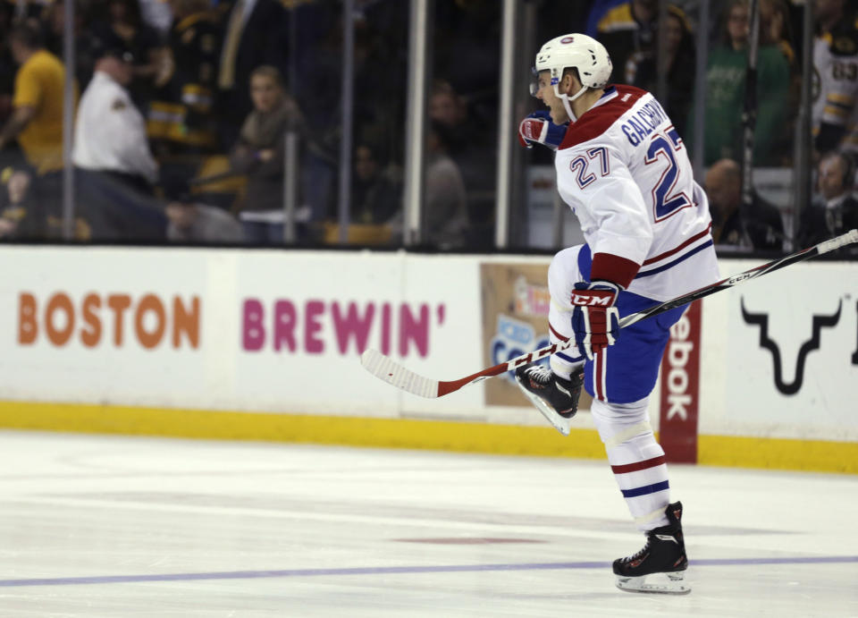 Montreal Canadiens center Alex Galchenyuk (27) celebrates his winning goal against Boston Bruins goalie Tuukka Rask in a shootout during an NHL hockey game, Monday, March 24, 2014, in Boston. The Canadiens defeated the Bruins 2-1. (AP Photo/Charles Krupa)