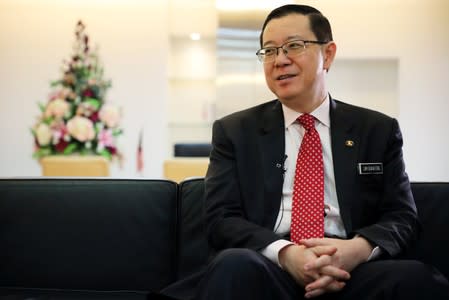 Malaysia's Finance Minister Lim Guan Eng speaks during an interview with Reuters in Putrajaya