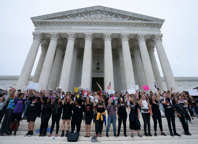 Protesters demonstrate outside the Supreme Court in Washington, DC in opposition to the Senate confirmation of Brett Kavanaugh to the court, October 6, 2018. (Photo by CHRIS KLEPONIS / AFP)CHRIS KLEPONIS/AFP/Getty Images ** OUTS - ELSENT, FPG, CM - OUTS * NM, PH, VA if sourced by CT, LA or MoD **