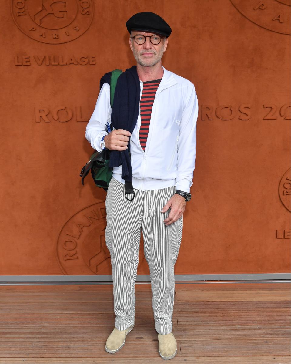 Sting, dressed hilariously appropriately for the occasion, attends the French Open.