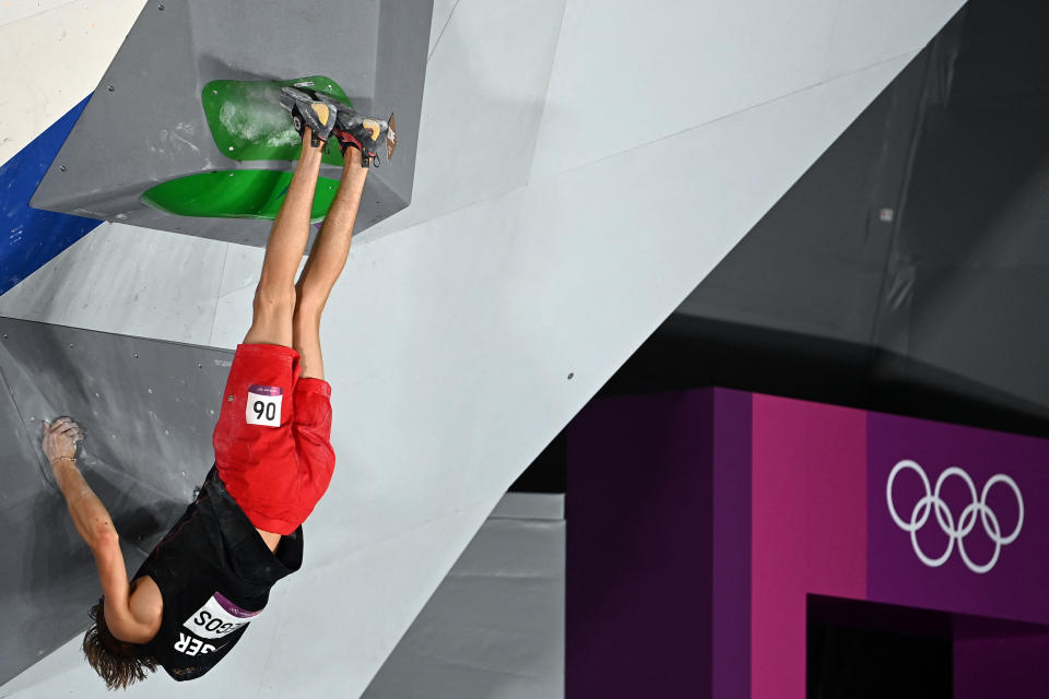 <p>Germany's Alexander Megos competes in the men's sport climbing bouldering qualification during the Tokyo 2020 Olympic Games at the Aomi Urban Sports Park in Tokyo on August 3, 2021. (Photo by MOHD RASFAN / AFP) (Photo by MOHD RASFAN/AFP via Getty Images)</p> 