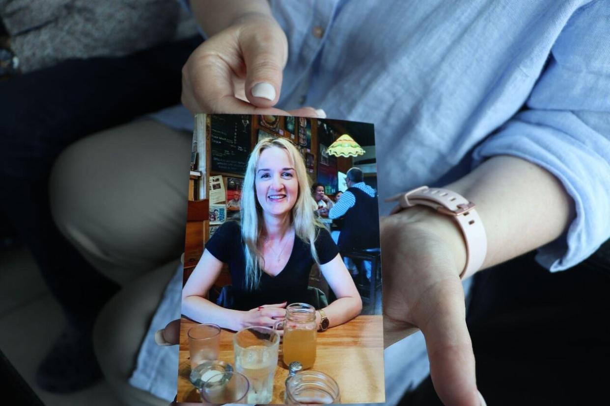 Marise Tanguay held a photo of her daughter, Josyane Tanguay Pelletier. In April 2023, the 36-year-old died after her car plummeted into a river in Montmagny, Que.  (Rachel Watts/CBC - image credit)