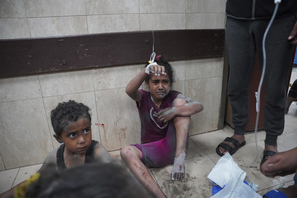 Palestinians wounded in the Israeli bombardment of the Gaza Strip are brought to Al Aqsa hospital in Deir al Balah, Gaza Strip, on Saturday, May 11, 2024. (AP Photo/Saher Alghorra)