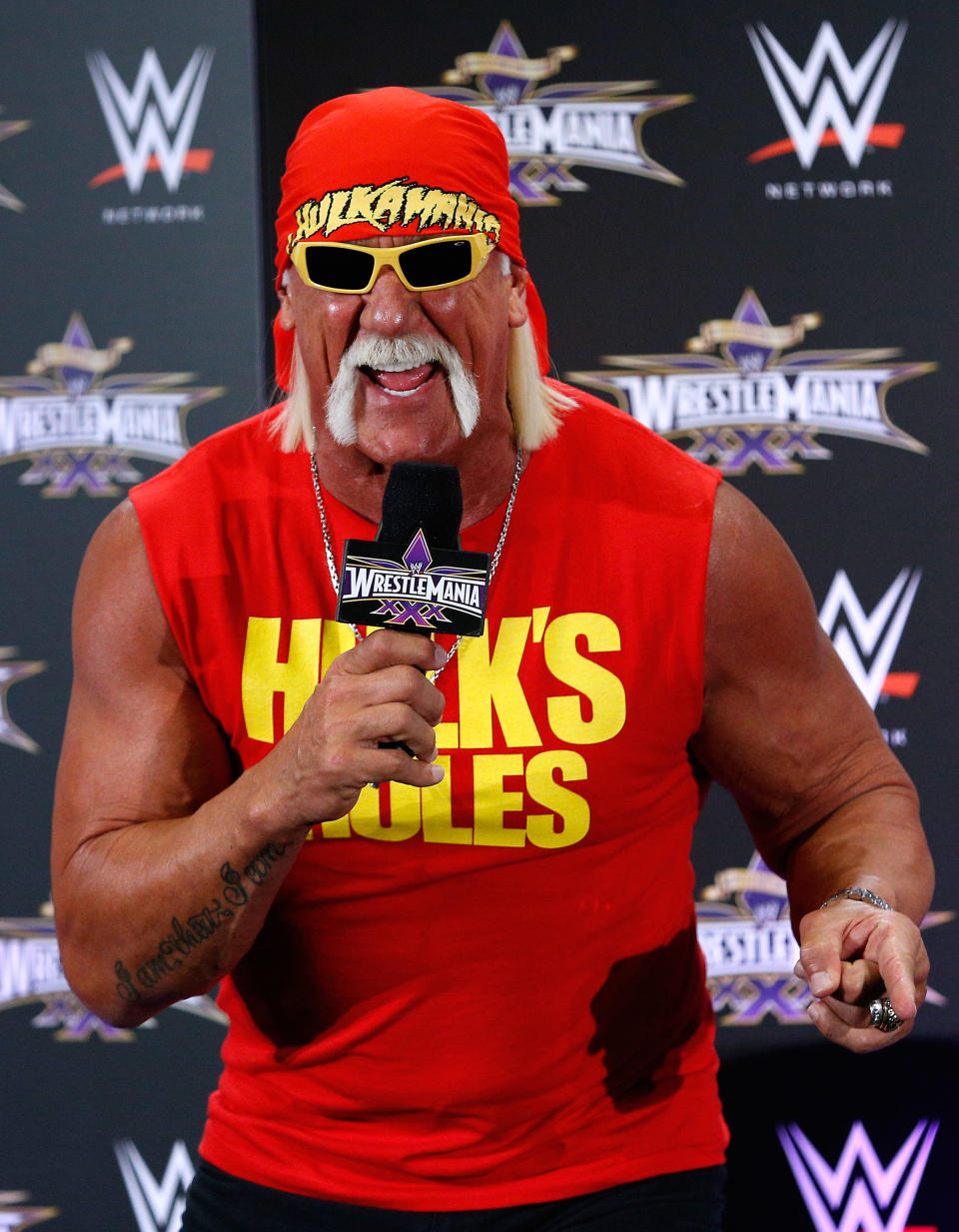 Hulk Hogan speaks during a news conference before Wrestlemania XXX at the Mercedes-Benz Super Dome in New Orleans on Sunday, April 6, 2014. (Jonathan Bachman/AP Images for WWE)