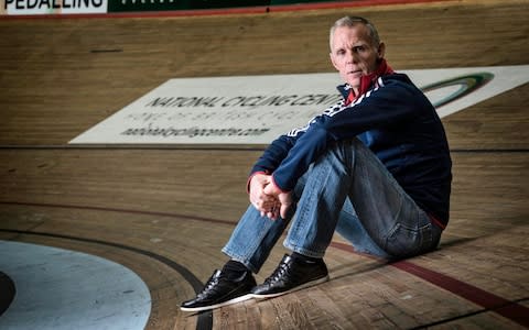 Shane Sutton sitting on the track at the National Cycling Centre in Manchester - Credit: Paul Cooper