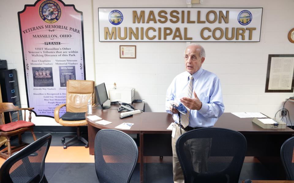 Massillon Municipal Judge Edward Elum talks last year about the multiple uses of the city's Court Services Building, also known as the "Getz Building." The judge and city of Massillon are locked in a legal tussle in state court on who has control the building.