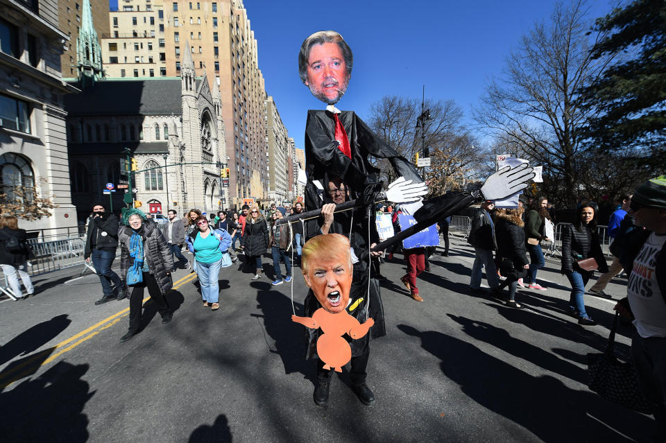 <p>Protesters march down Central Park West in New York City during a “Not My President’s Day” rally on Feb. 20, 2017, as part of a protest against President Trump. (Timothy A. Clary/AFP/Getty Images) </p>