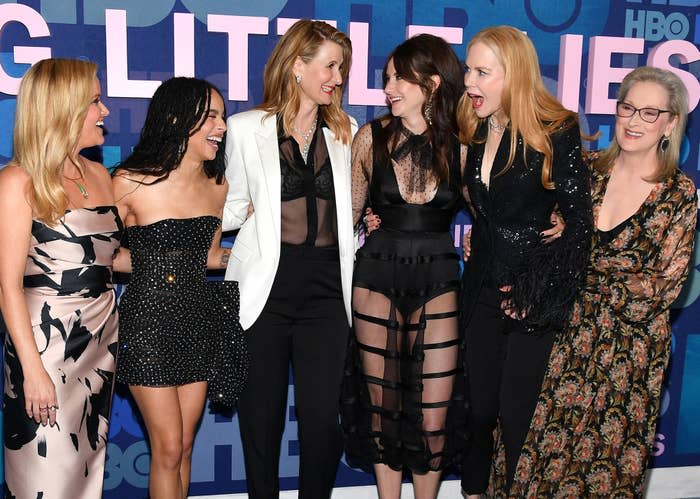 The cast of Big Little Lies laughing together on the red carpet