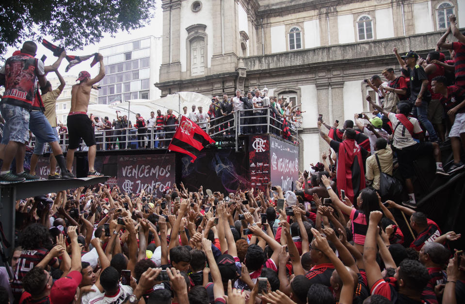 Players of Brazil's Flamengo parade at their arrival in Rio de Janeiro, Brazil, Sunday, Nov. 24, 2019. Flamengo overcame Argentina's River Plate 2-1 in the Copa Libertadores final match on Saturday in Lima to win its second South American title. (AP Photo/Ricardo Borges)