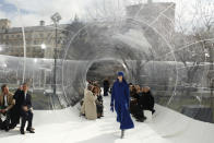 A model wears a creation for the Kenzo fashion collection during Women's fashion week Fall/Winter 2020/21 presented in Paris, Wednesday, Feb. 26, 2020. (AP Photo/Thibault Camus)