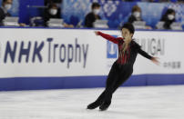 Kazuki Tomono of Japan performs during a free skating of an ISU Grand Prix of Figure Skating competition in Kadoma near Osaka, Japan, Saturday, Nov. 28, 2020. (AP Photo/Hiro Komae)